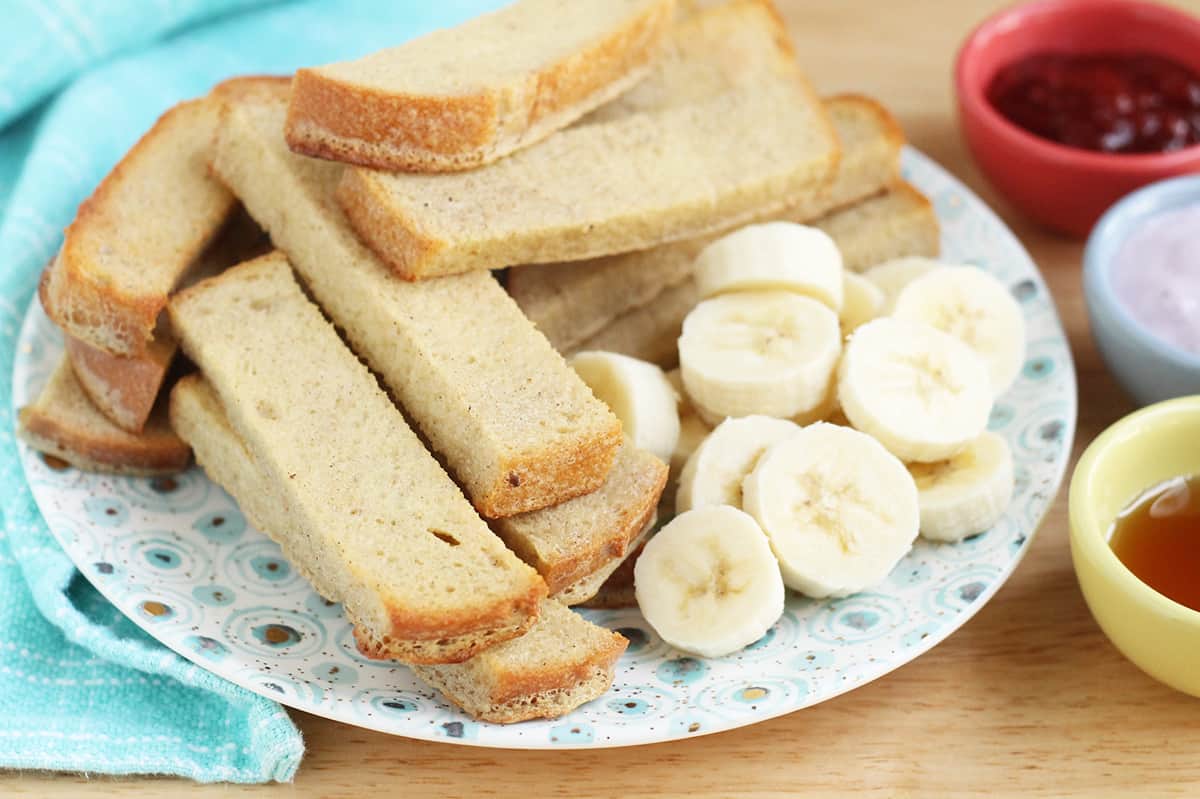 baked-french-toast-sticks-on-plate-with-bananas