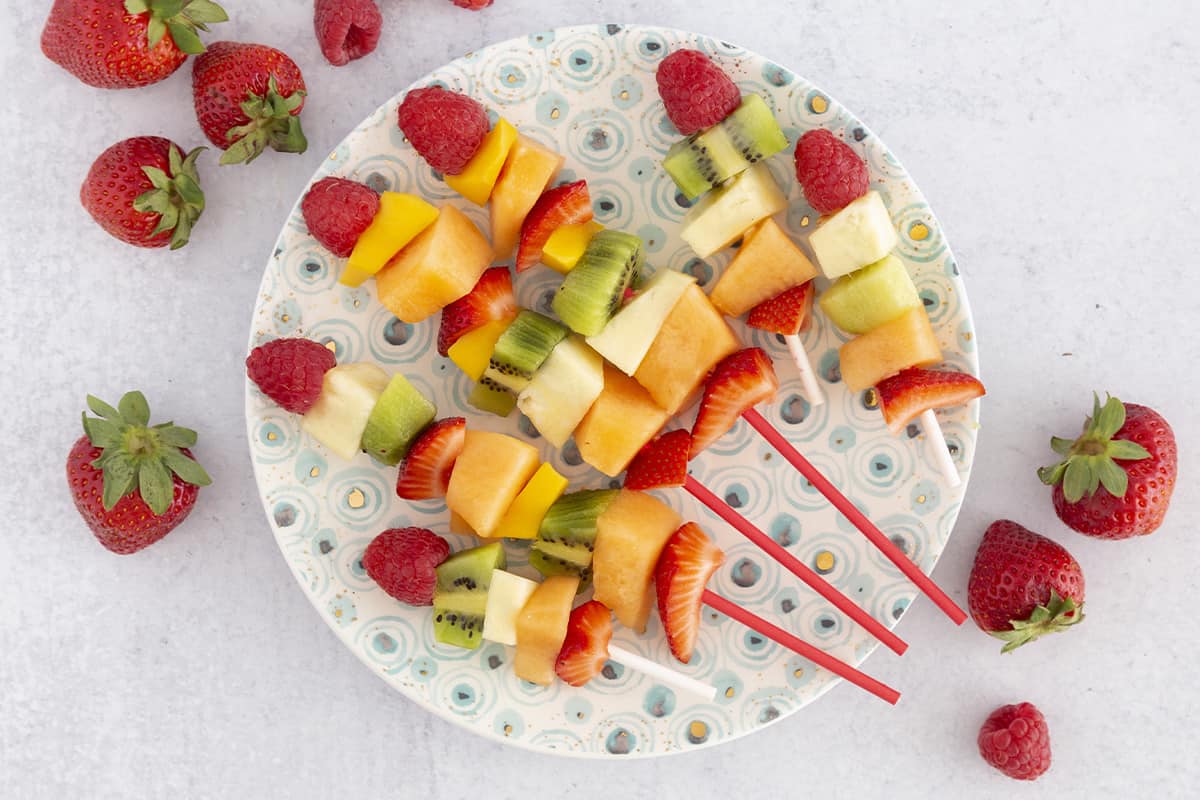 fruit sticks on polka dot plate
